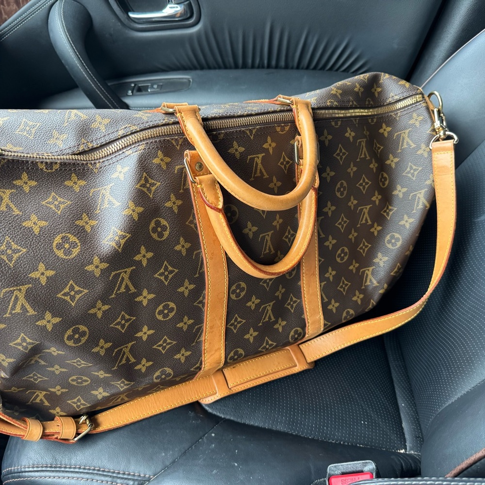 Louis Vuitton Travel Bag in Brown and Gold